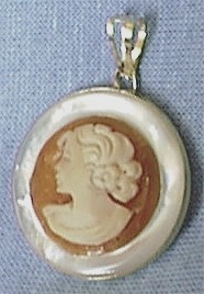 Shell Cameo on Mother of Pearl. Left Profile